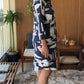 Kleid mit geometrischem Print am Revers