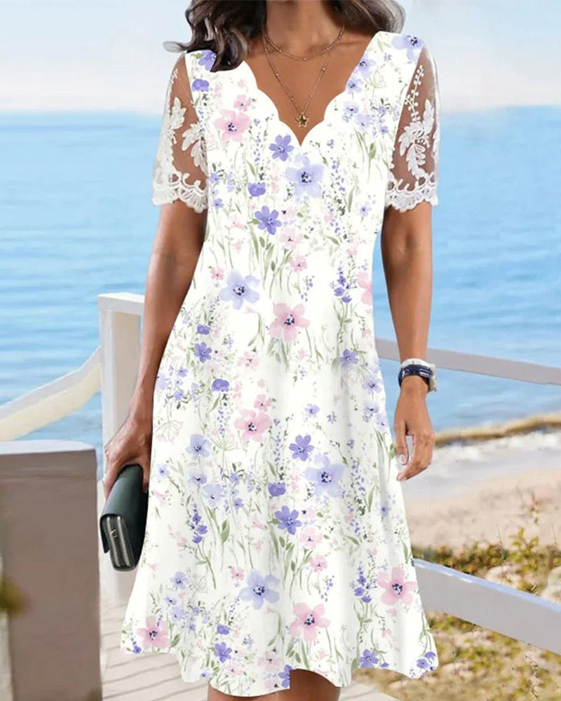 Kleid mit Blumen- und Spitzenärmeln