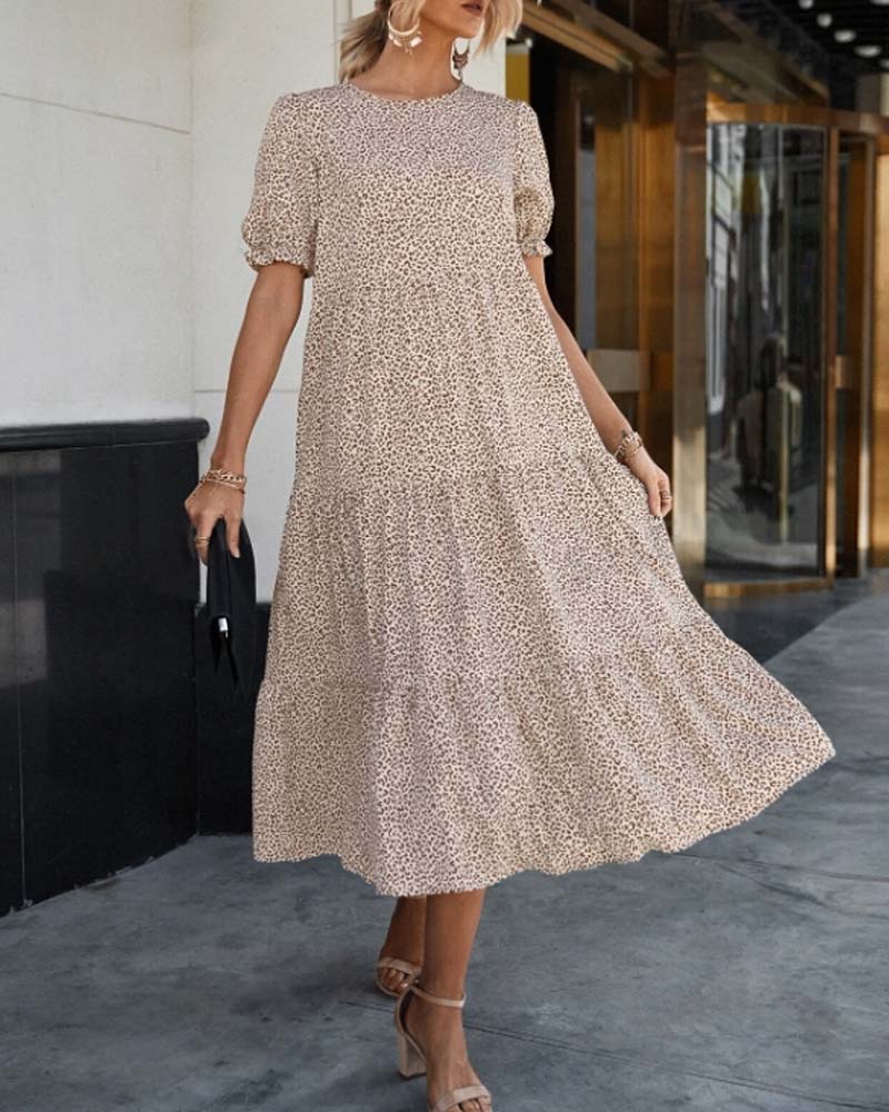 Elegantes Kleid mit Rundhalsausschnitt und Puffärmeln