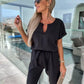 LIORA - Jumpsuit mit Schleifendetail - LOVEZOE