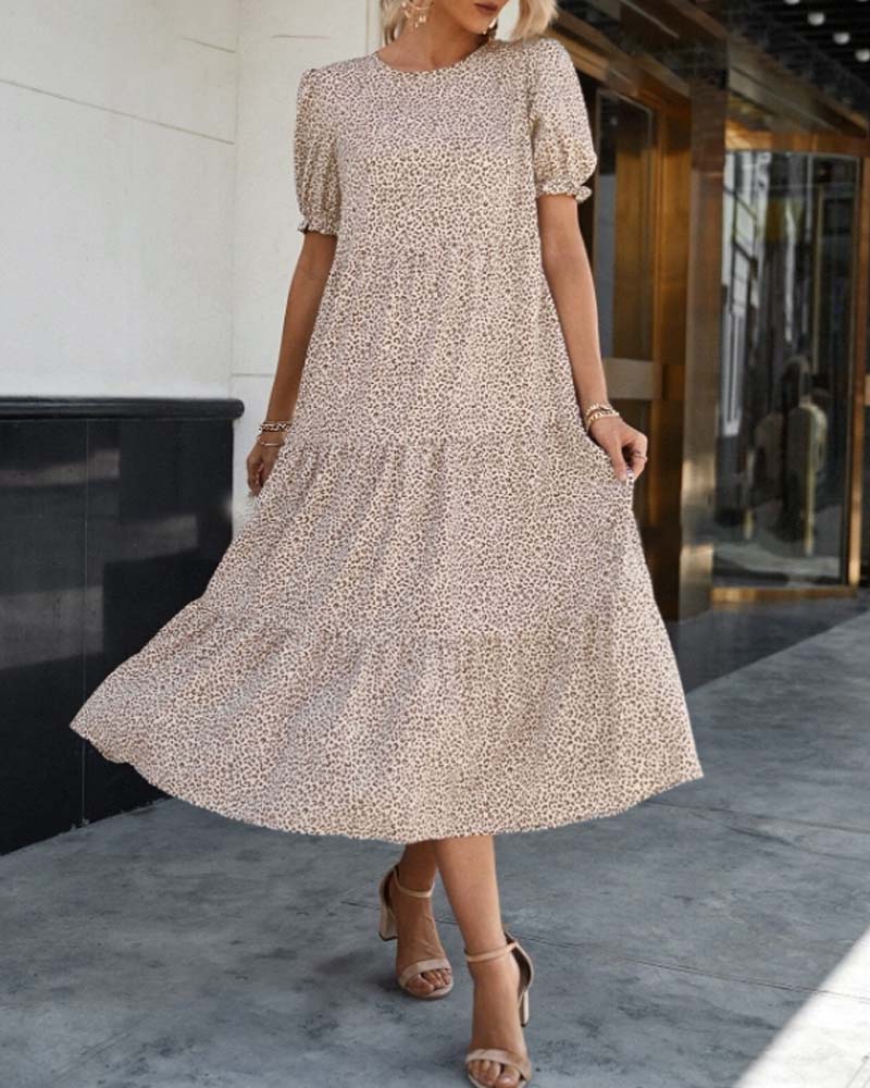 Elegantes Kleid mit Rundhalsausschnitt und Puffärmeln